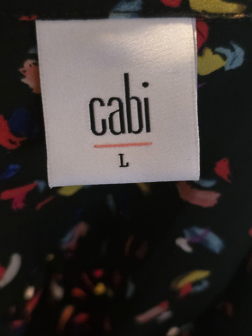 Cabi Ferris Blouse features a colorful "Confetti Party" abstract print on a blac - Picture 3 of 4